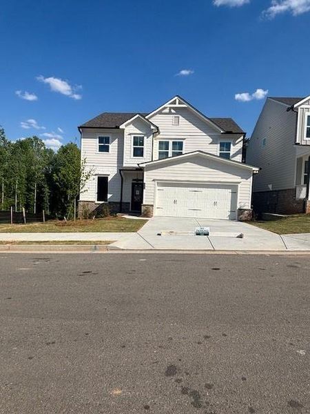 Front exterior of a new home in , Buford, GA, highlighting curb appeal (Image 14). Front exterior of a new home in , Buford, GA, highlighting curb appeal (Image 14).