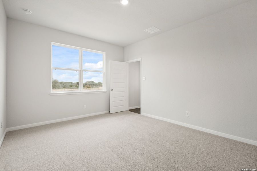 Spacious, unfurnished interior of a new home in Abbott Place, St. Hedwig (Image 27).