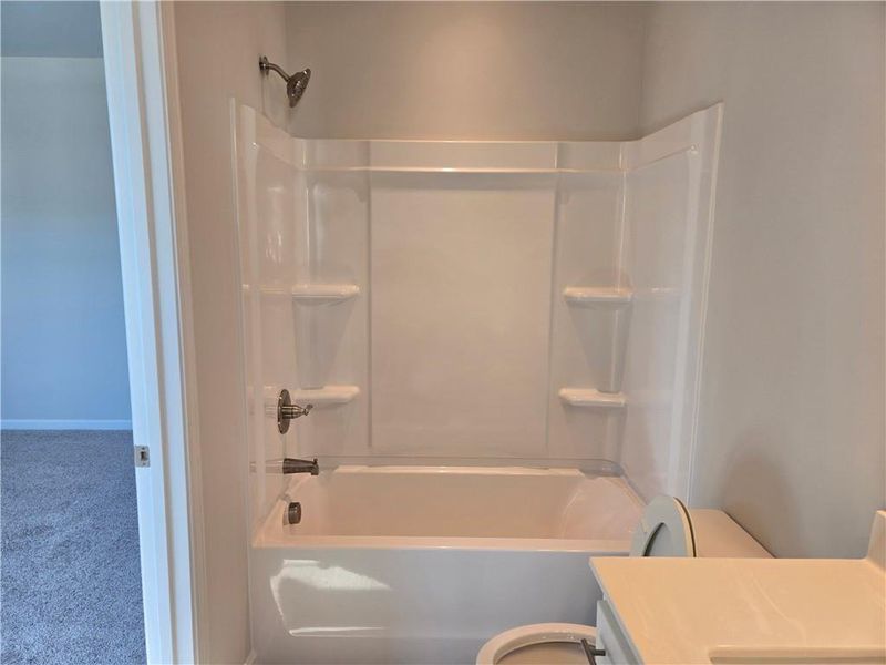 Furnished interior view inside a new home in Enclave at Logan Point, Loganville (Image 9).
