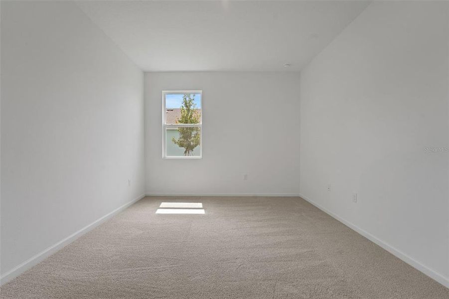 Spacious, unfurnished interior of a new home in Annabelle Estates, Winter Haven (Image 23).