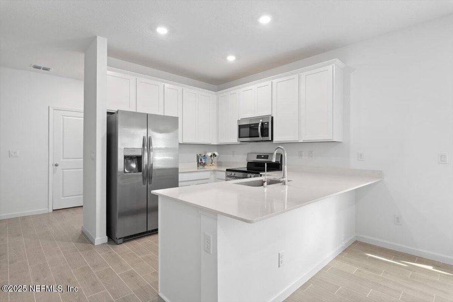Furnished interior view inside a new home in Hardwick Farms: Hardwick Farms - Townhome Collection, Jacksonville (Image 40).