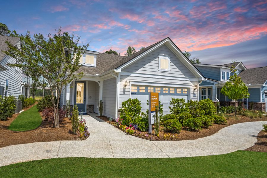 Front exterior of a new home in Del Webb Savannah at Heartwood, Richmond Hill, GA, highlighting curb appeal (Image 26). Front exterior of a new home in Del Webb Savannah at Heartwood, Richmond Hill, GA, highlighting curb appeal (Image 26).