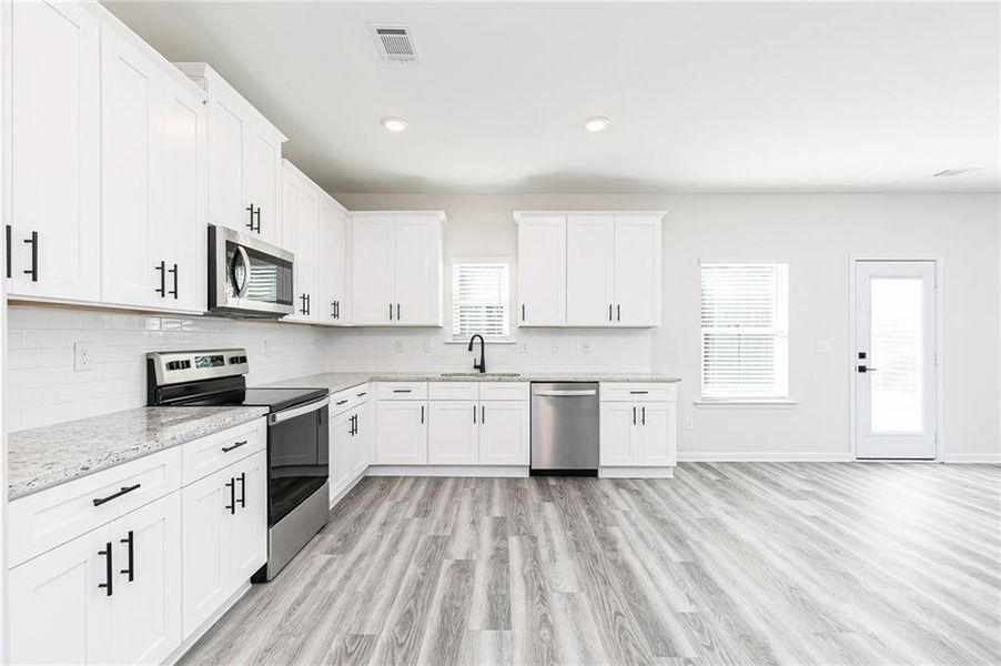 Furnished interior view inside a new home in , Jefferson (Image 8).