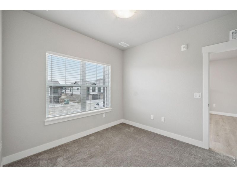 Spacious, unfurnished interior of a new home in Highlands at Fox Hill - The Flats, Longmont (Image 11).