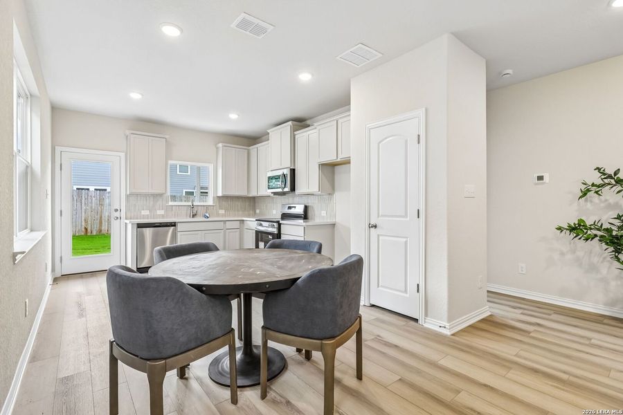 Furnished interior view inside a new home in Casinas at Gruene, New Braunfels (Image 11).