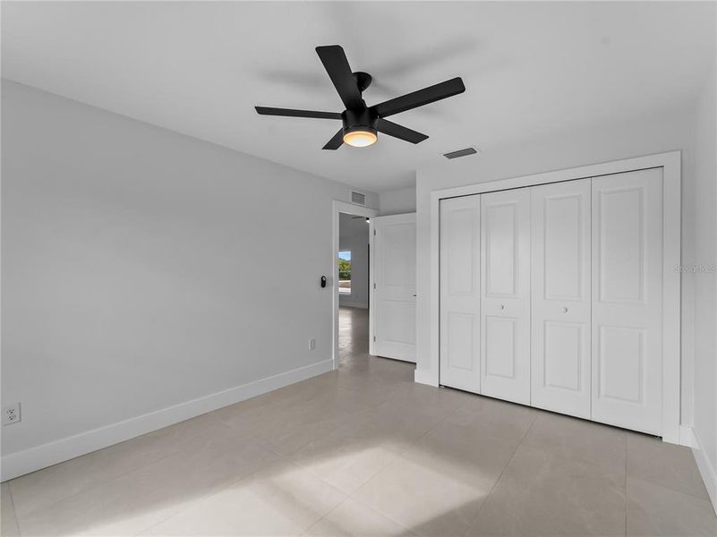 Spacious, unfurnished interior of a new home in , Port Charlotte (Image 49).