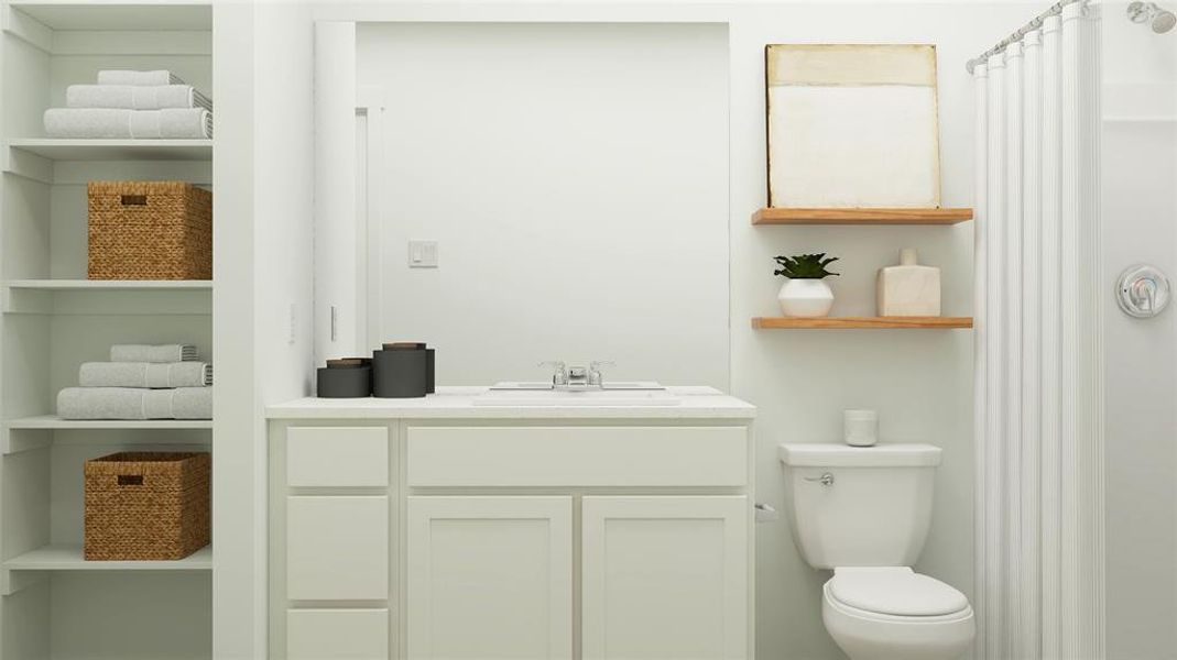 Bathroom with vanity and toilet