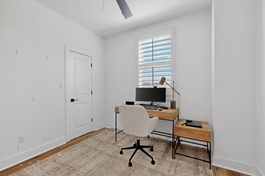 Bedroom #4 featuring light wood-type flooring and ceiling fan