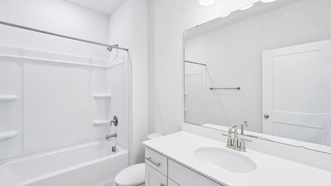 Representative furnished interior of a home built from the Hickory by D.R. Horton in Westport, York (Image 10).