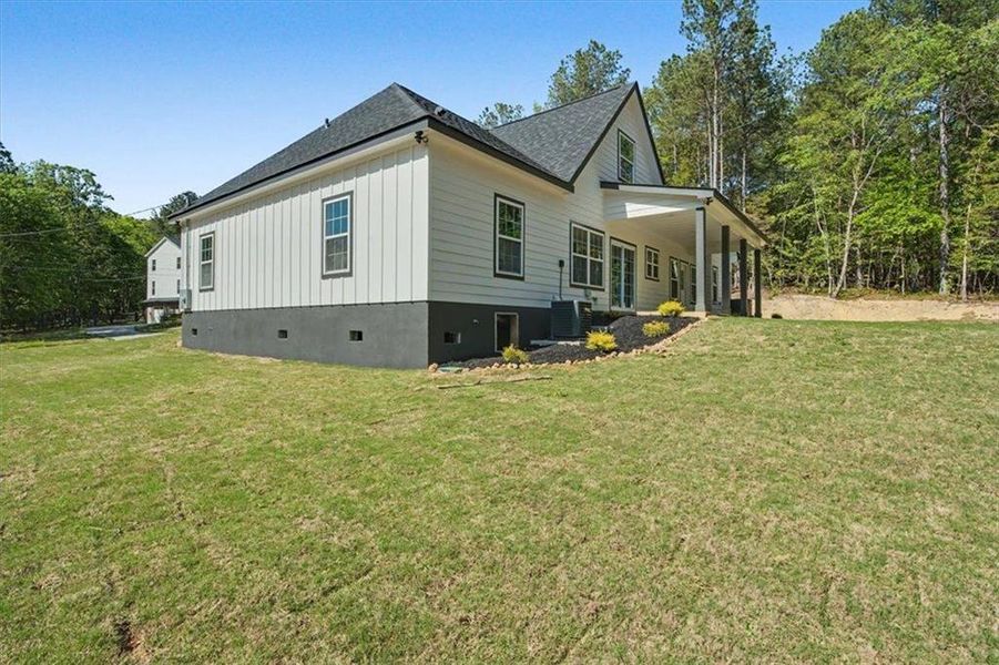Exterior details and patio area of a home in , Lindale (Image 30).