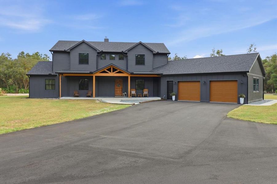 Front exterior of a new home in , Inglis, FL, highlighting curb appeal (Image 35).