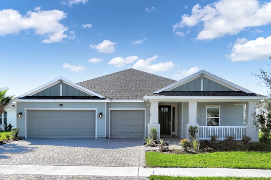 Front exterior of a new home in Headwaters at Lofton Creek, Yulee, FL, highlighting curb appeal (Image 1). Front exterior of a new home in Headwaters at Lofton Creek, Yulee, FL, highlighting curb appeal (Image 1).