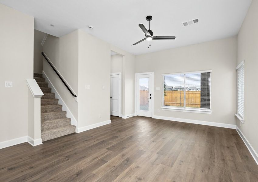 The living room has plenty of space for large furniture.