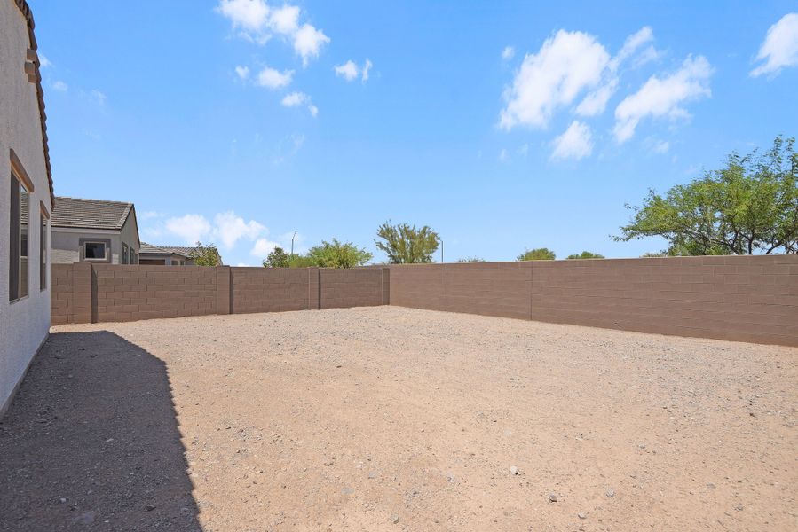 Front exterior of a new home in CantaMia at Estrella 55+, Goodyear, AZ, highlighting curb appeal (Image 2).