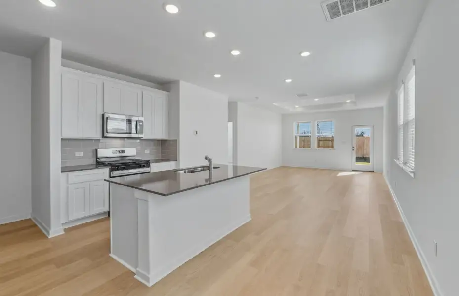 Furnished interior view inside a new home in Sunfield, Buda (Image 4).
