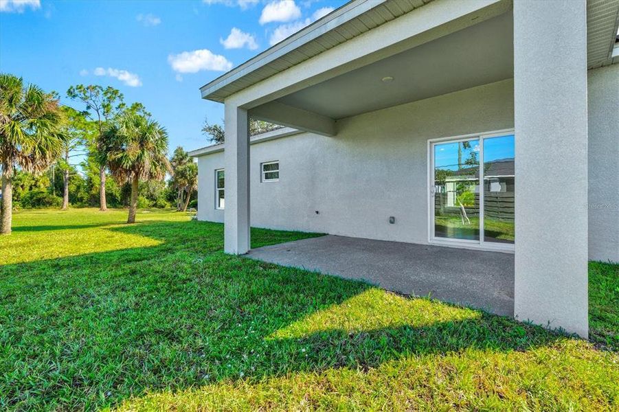 Exterior details and patio area of a home in , North Port (Image 22).