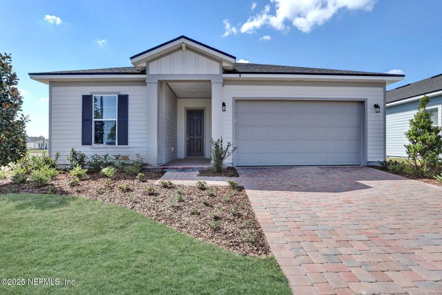 Front exterior of a new home in , Palm Coast, FL, highlighting curb appeal (Image 15). Front exterior of a new home in , Palm Coast, FL, highlighting curb appeal (Image 15).
