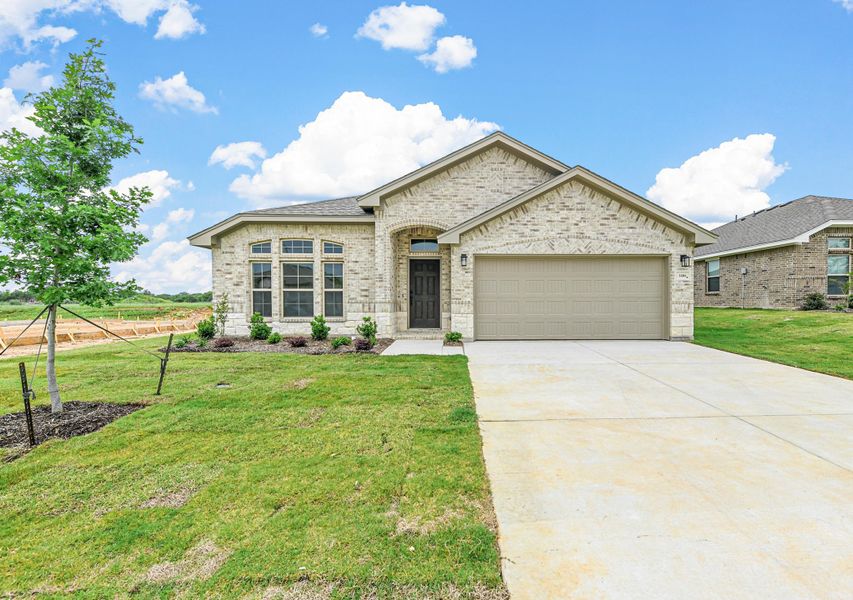 Representative exterior photo of a completed home built from the Sherwood by Cheldan Homes in Sunset Ridge, Keene, TX (Image 30). Representative exterior photo of a completed home built from the Sherwood by Cheldan Homes in Sunset Ridge, Keene, TX (Image 30).