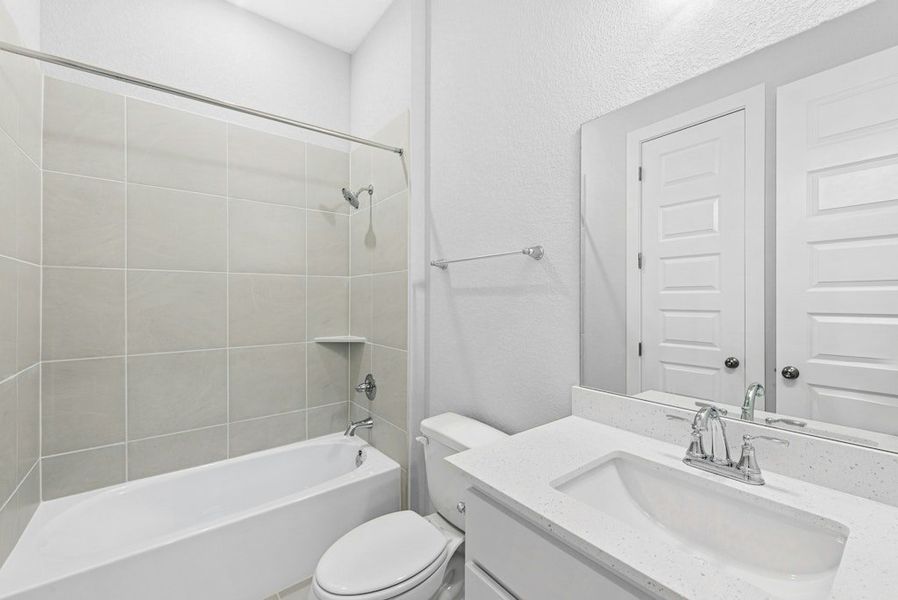 Furnished interior view inside a new home in The Colony, Bastrop (Image 17).