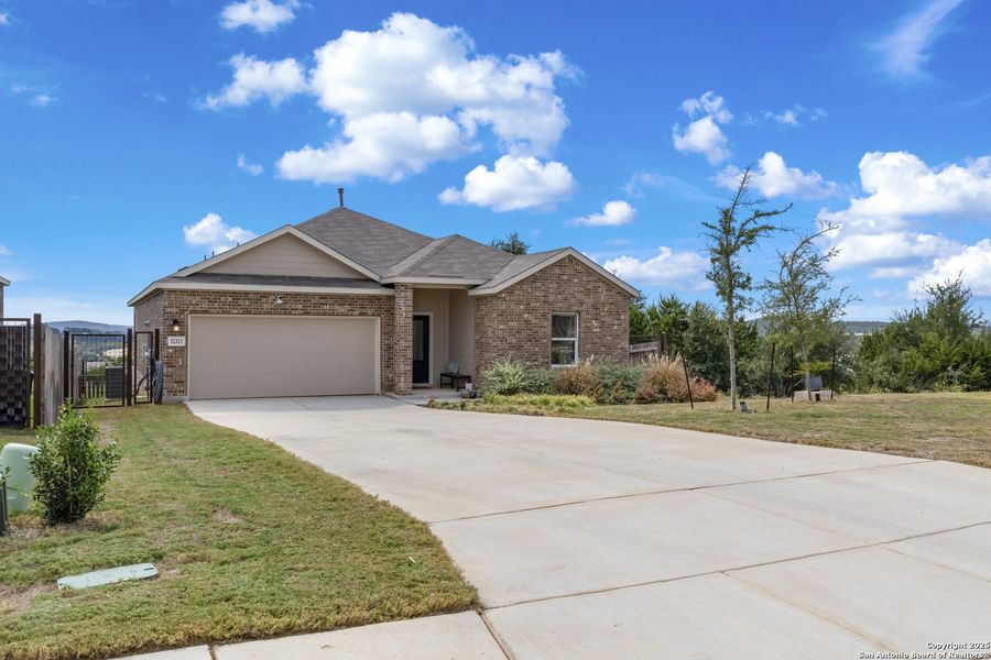 Front exterior of a new home in , Bulverde, TX, highlighting curb appeal (Image 1). Front exterior of a new home in , Bulverde, TX, highlighting curb appeal (Image 1).