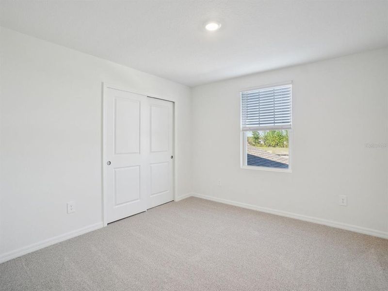Spacious, unfurnished interior of a new home in Two Rivers - Classic Series, Zephyrhills (Image 17).