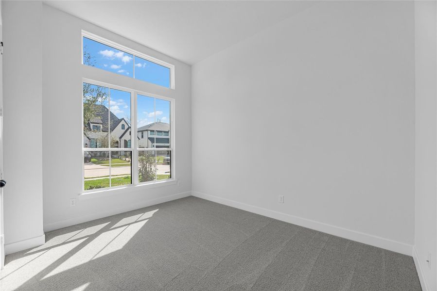 Spacious, unfurnished interior of a new home in Sienna, Missouri City (Image 13).