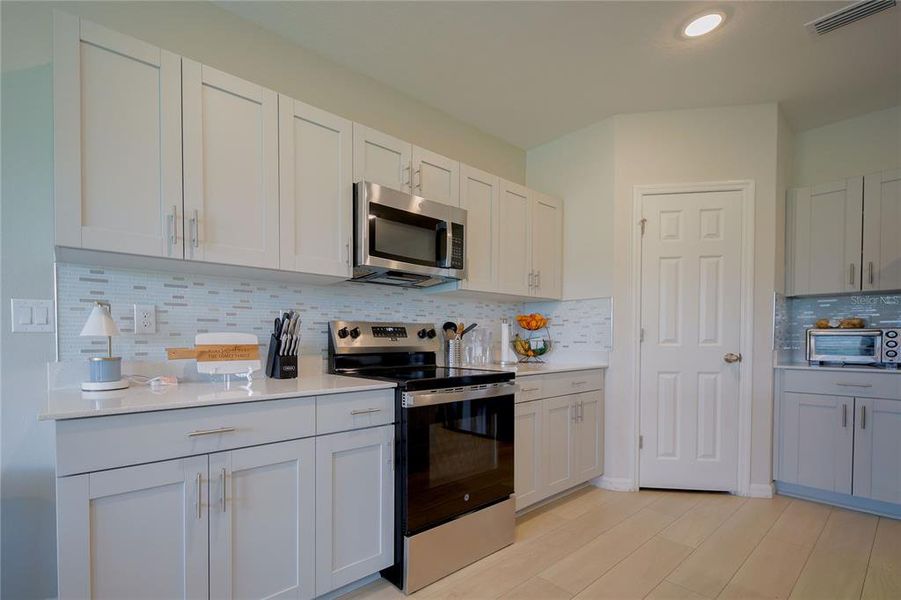 Furnished interior view inside a new home in Pasadena Point, Wesley Chapel (Image 14). Furnished interior view inside a new home in Pasadena Point, Wesley Chapel (Image 14).