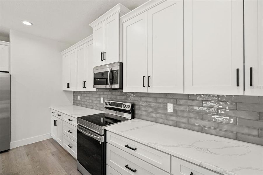 Furnished interior view inside a new home in , Dunnellon (Image 7).