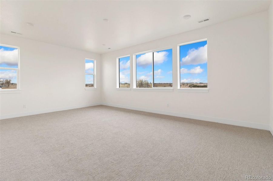 Spacious, unfurnished interior of a new home in Kitchel Lake at Serratoga Falls, Timnath (Image 12).