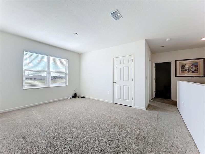 Spacious, unfurnished interior of a new home in Cypress Bay West, Palm Bay (Image 21).