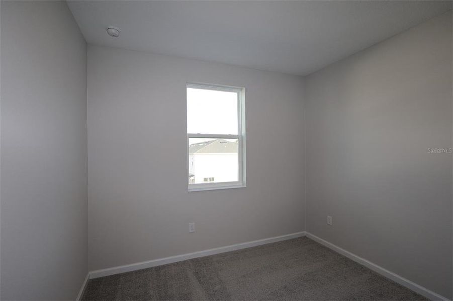 Spacious, unfurnished interior of a new home in Tribute at Ovation, Winter Garden (Image 32). Spacious, unfurnished interior of a new home in Tribute at Ovation, Winter Garden (Image 32).