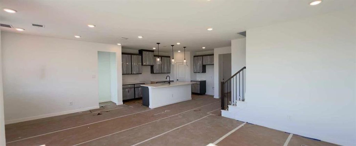 Open Kitchen-Living Room Construction Progress featuring the Minimalist Collection