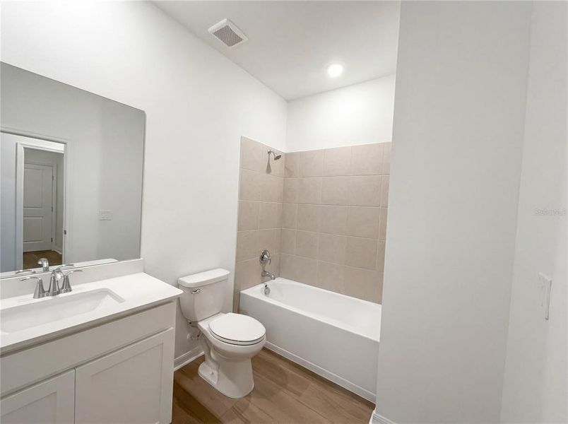 Furnished interior view inside a new home in Grand Park, Dunnellon (Image 5).