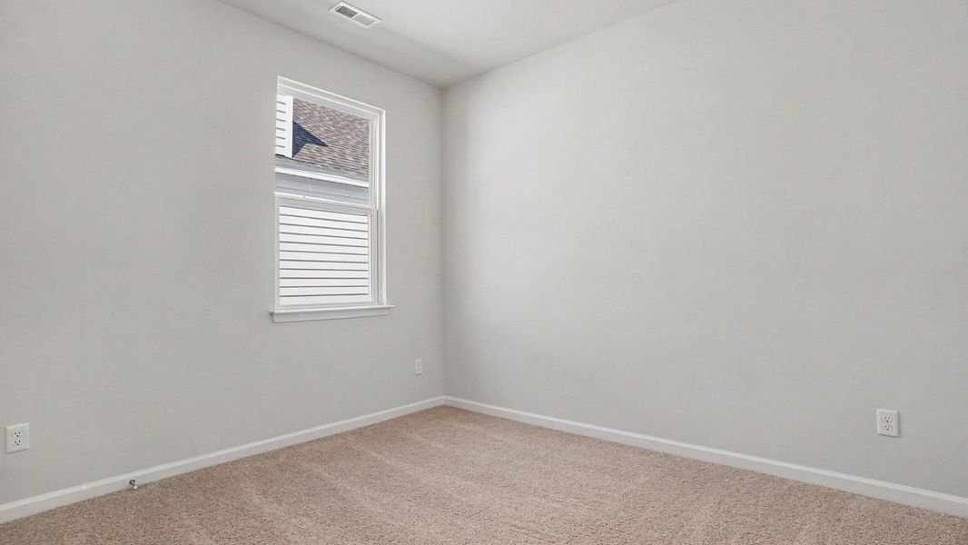 Spacious, unfurnished interior of a new home in The Meadows at Wildwood Village, Shallotte (Image 11).