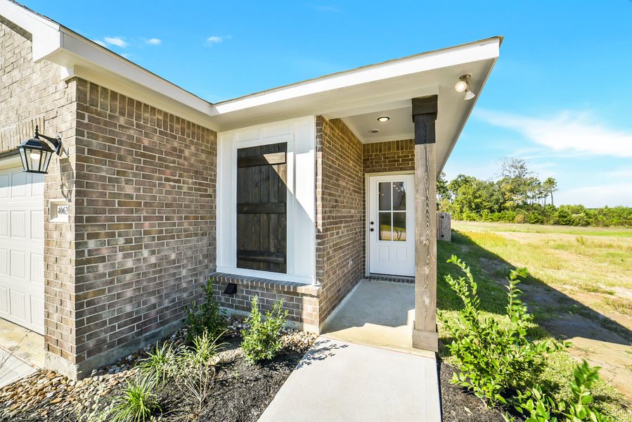 Exterior details and patio area of a home in Mostyn Springs, Magnolia (Image 3). Exterior details and patio area of a home in Mostyn Springs, Magnolia (Image 3).