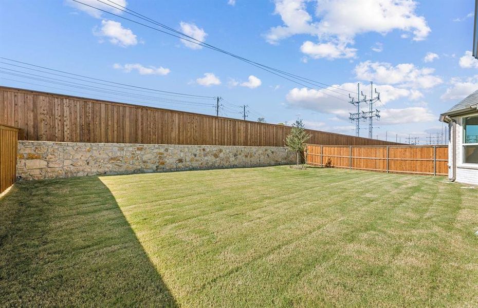 Spacious, fenced-in backyard Spacious, fenced-in backyard