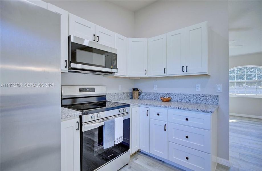 Furnished interior view inside a new home in , Avon Park (Image 5).