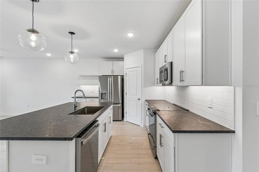 Furnished interior view inside a new home in Aspire at Canter Creek, Davenport (Image 7).