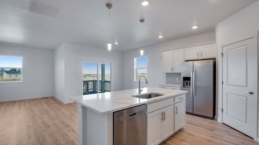 Furnished interior view inside a new home in Trails at Crowfoot, Parker (Image 6).