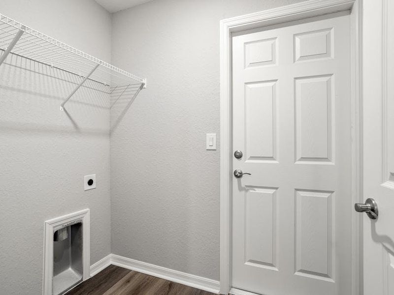 You will appreciate convenient features, such as a dedicated laundry room - Begonia by Highland Homes