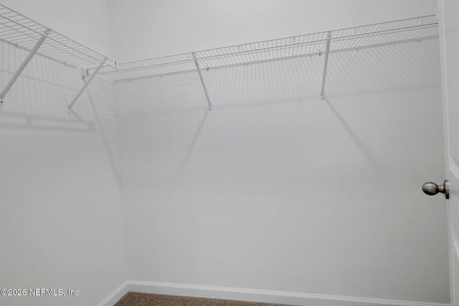 Spacious, unfurnished interior of a new home in The Hammock at Palm Harbor, Palm Coast (Image 28).