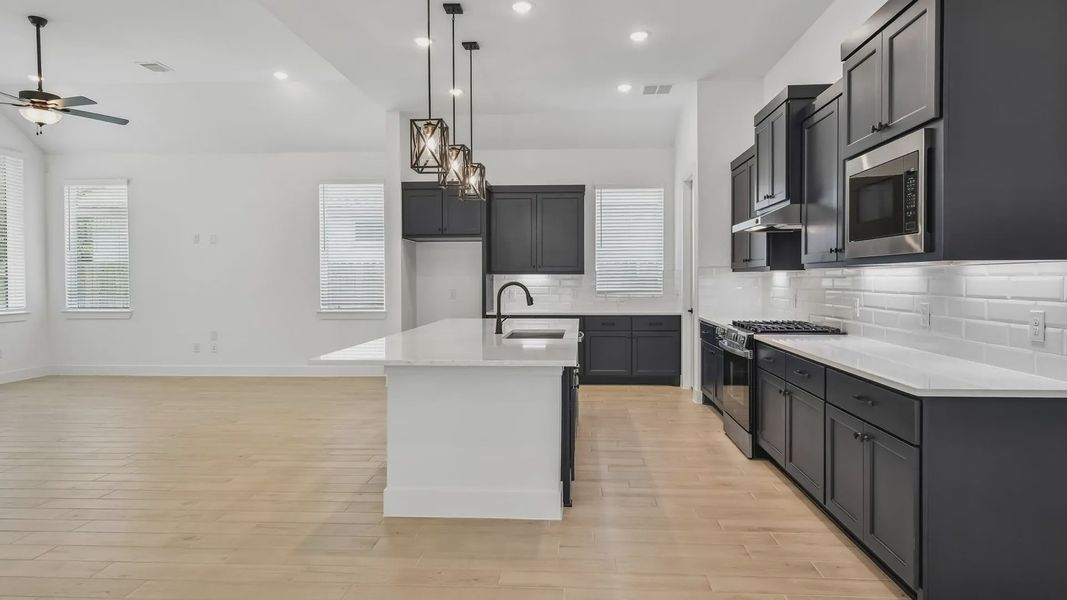 Furnished interior view inside a new home in Artavia, Conroe (Image 12).