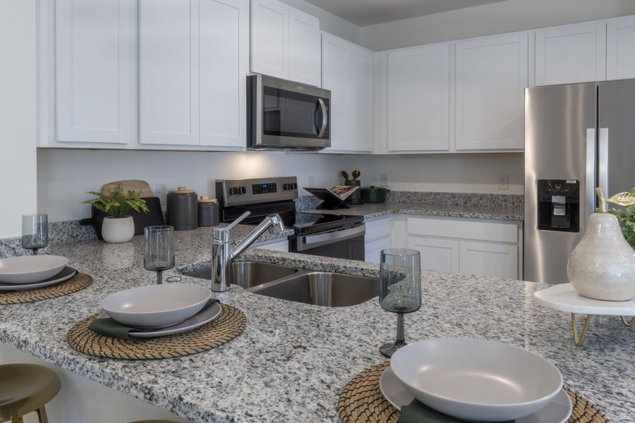 Ashley Plan at Pine Meadows Reserve Townhomes by Trinity Family Builders