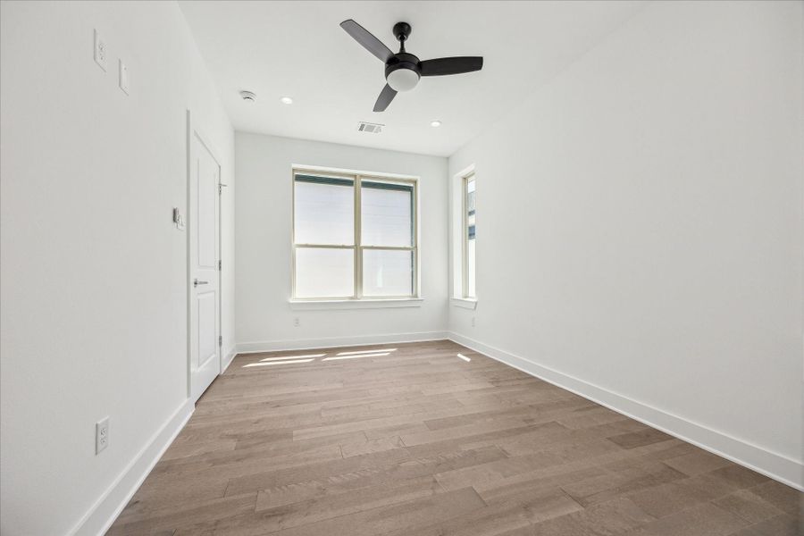 One of the Secondary Bedrooms * On the Third Floor * Hardwood Floors.
