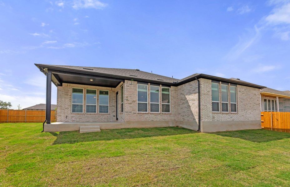 Front exterior of a new home in 6 Creeks, Kyle, TX, highlighting curb appeal (Image 2). Front exterior of a new home in 6 Creeks, Kyle, TX, highlighting curb appeal (Image 2).
