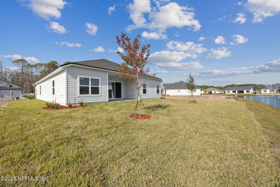 Exterior details and patio area of a home in Sandy Ridge, Yulee (Image 18).