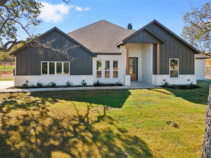 Front exterior of a new home in Lucky Ridge, Boyd, TX, highlighting curb appeal (Image 20). Front exterior of a new home in Lucky Ridge, Boyd, TX, highlighting curb appeal (Image 20).