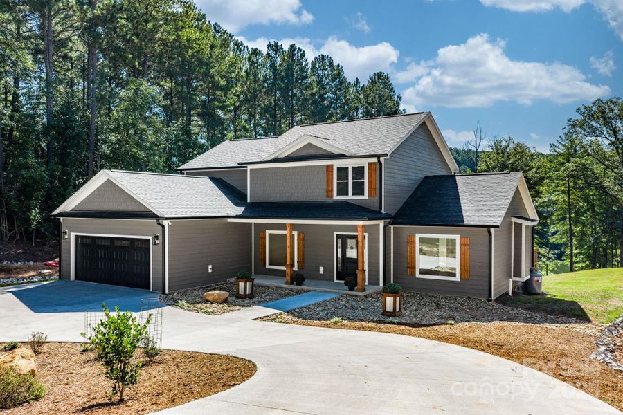 Front exterior of a new home in , Connelly Springs, NC, highlighting curb appeal (Image 20).