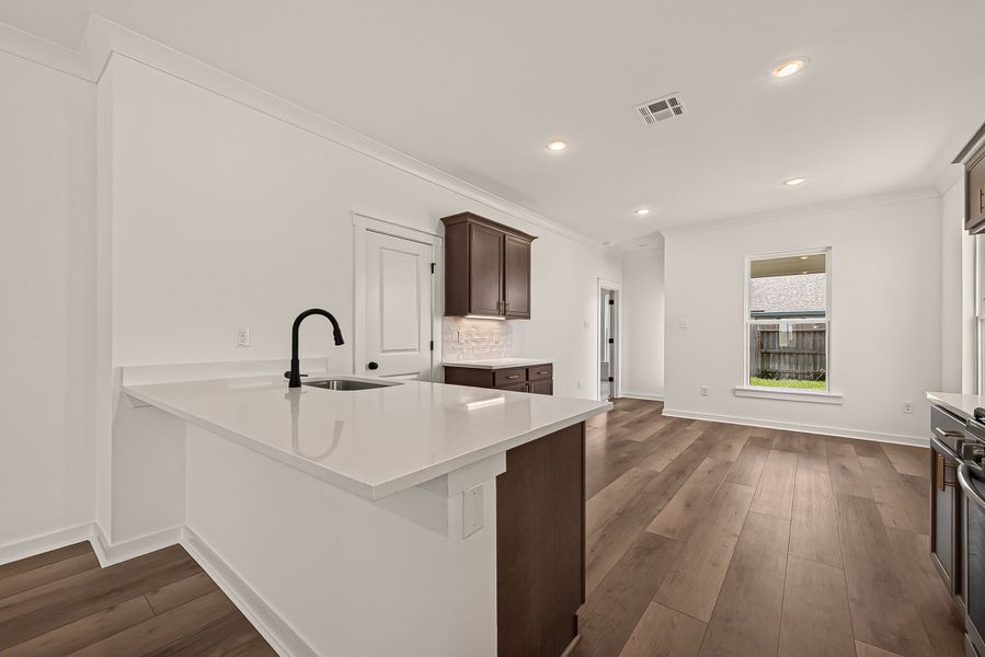 Furnished interior view inside a new home in Aldeana, Bonney (Image 6).