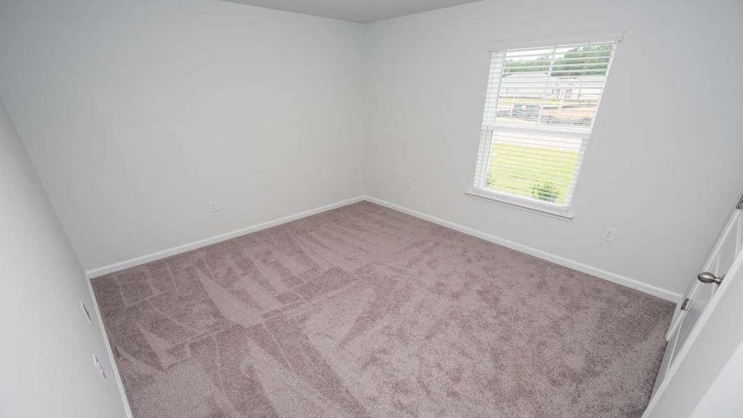Representative unfurnished interior of a home built from the KERRY by D.R. Horton in Stanbury Creek, Supply (Image 14).